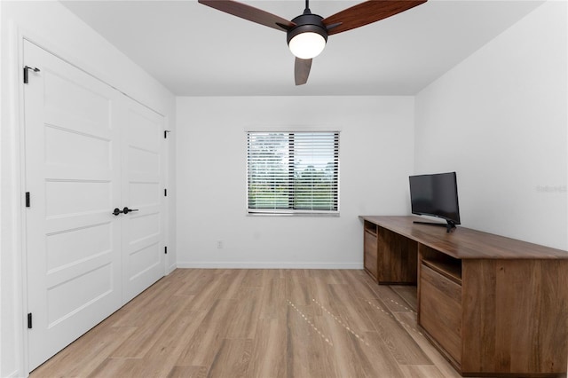 home office featuring ceiling fan and light wood-type flooring