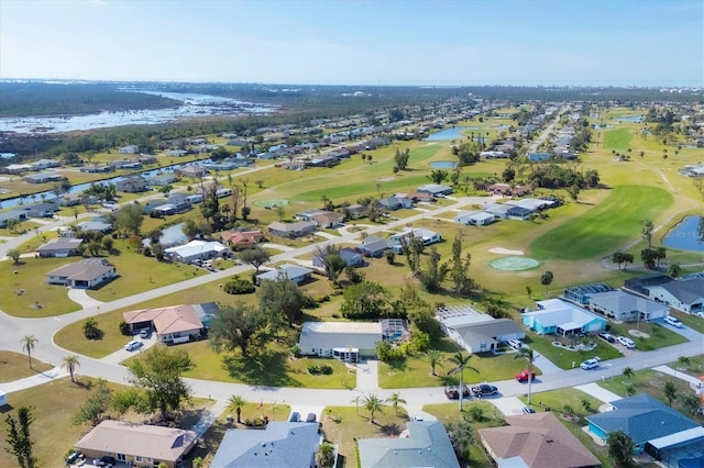 birds eye view of property featuring a water view, a residential view, and golf course view