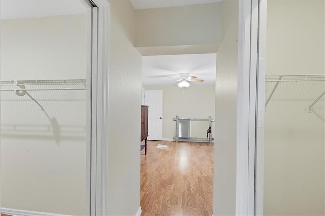 interior space featuring ceiling fan and wood finished floors