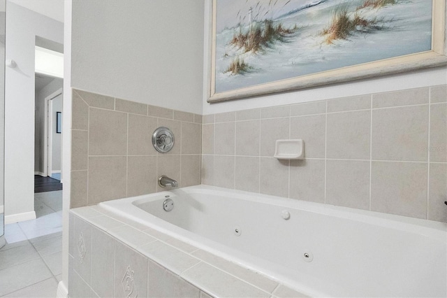 full bathroom with a jetted tub and tile patterned floors