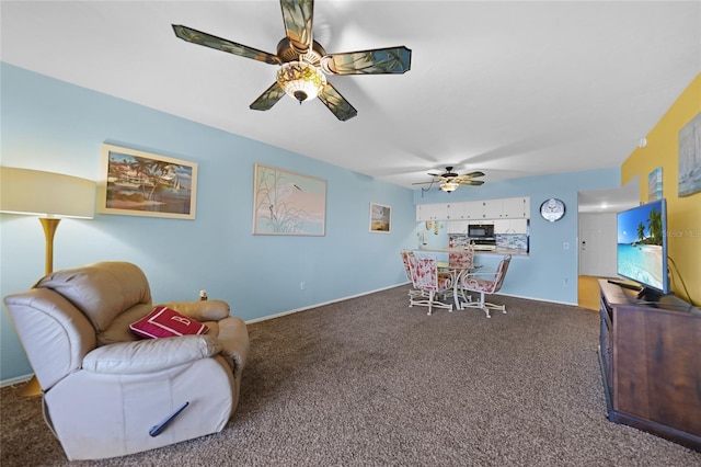 interior space with carpet and ceiling fan