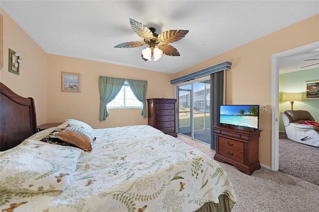 bedroom with light colored carpet, access to exterior, and ceiling fan