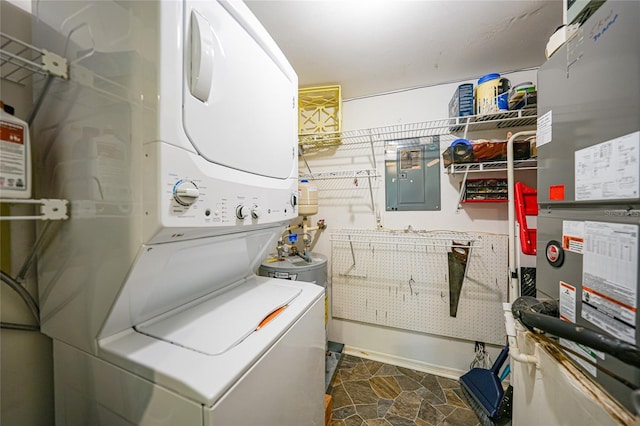 laundry area with stacked washing maching and dryer and electric panel