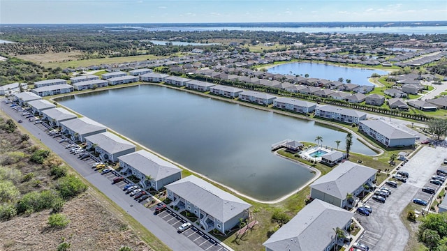 aerial view featuring a water view and a residential view