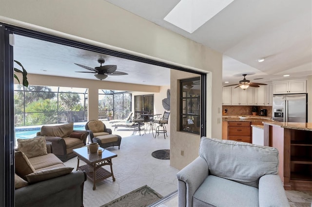 living room with ceiling fan