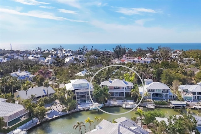 drone / aerial view featuring a water view