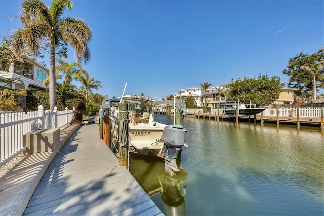 dock area featuring a water view