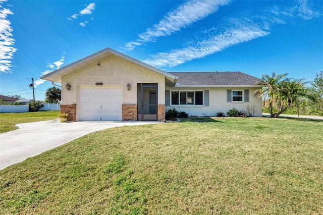 ranch-style home featuring a garage and a front yard