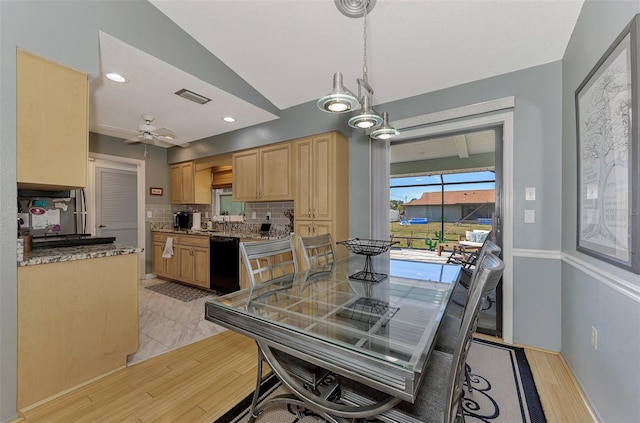 kitchen with light brown cabinetry, light hardwood / wood-style flooring, dishwasher, pendant lighting, and backsplash