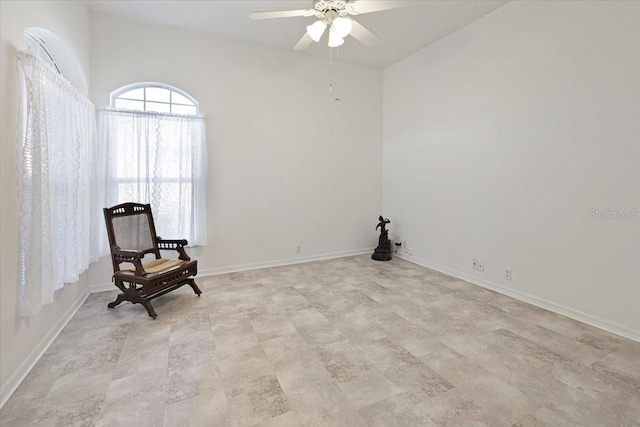 unfurnished room with ceiling fan