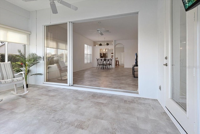 view of patio featuring ceiling fan