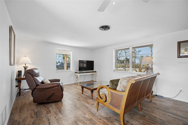 living room with hardwood / wood-style flooring and ceiling fan