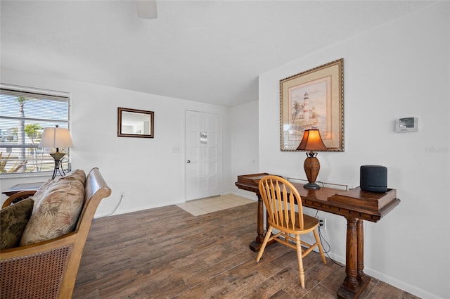 office space with wood-type flooring