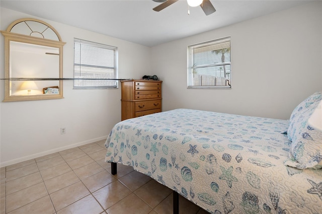 bedroom featuring light tile patterned flooring and ceiling fan