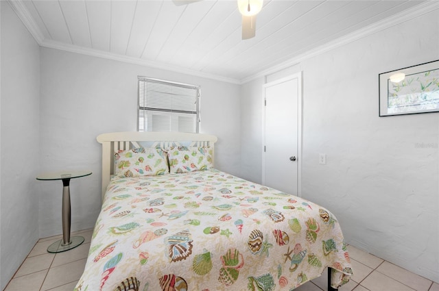 tiled bedroom with wood ceiling, ceiling fan, and ornamental molding