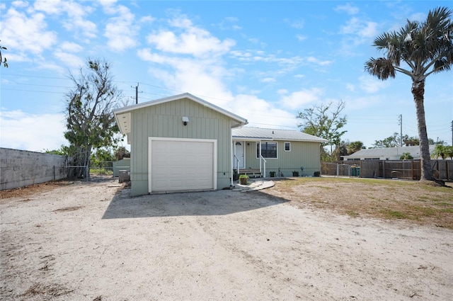 exterior space with a garage