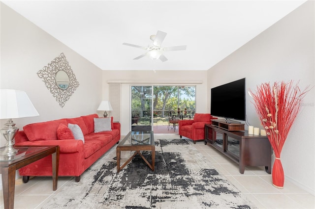 tiled living room featuring ceiling fan