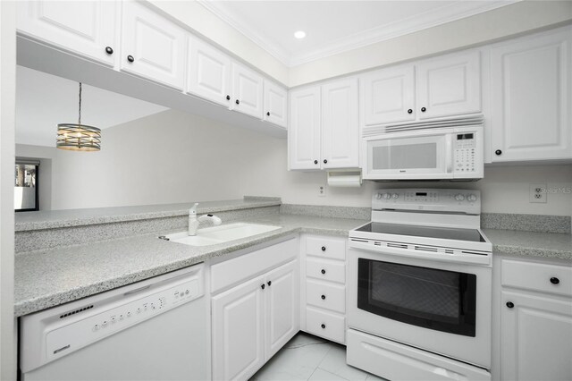 kitchen with white cabinetry, sink, white appliances, and hanging light fixtures