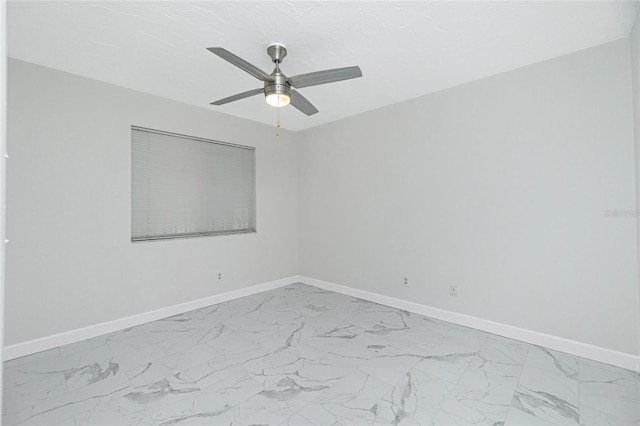 spare room featuring ceiling fan