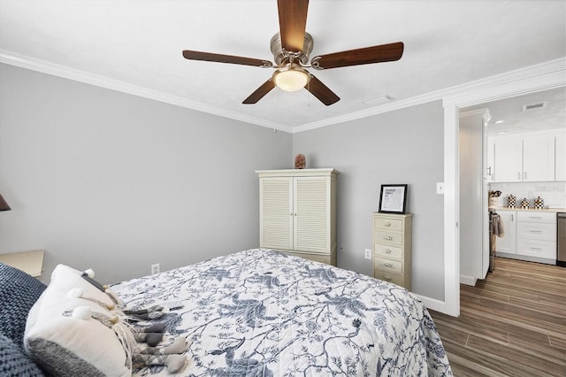 bedroom featuring ornamental molding, hardwood / wood-style floors, and ceiling fan