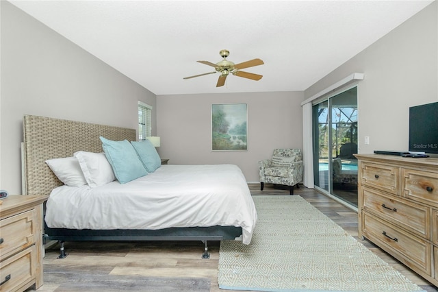 bedroom with light hardwood / wood-style flooring, access to outside, and ceiling fan