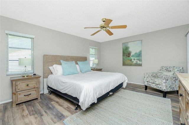 bedroom featuring ceiling fan and wood-type flooring