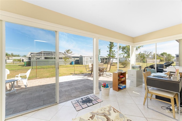 sunroom / solarium with a residential view