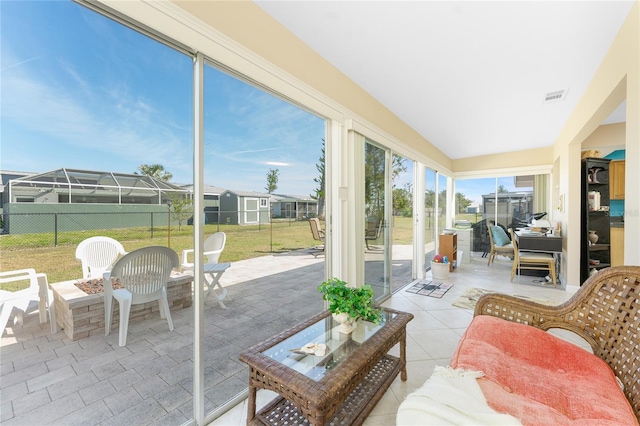 sunroom featuring visible vents