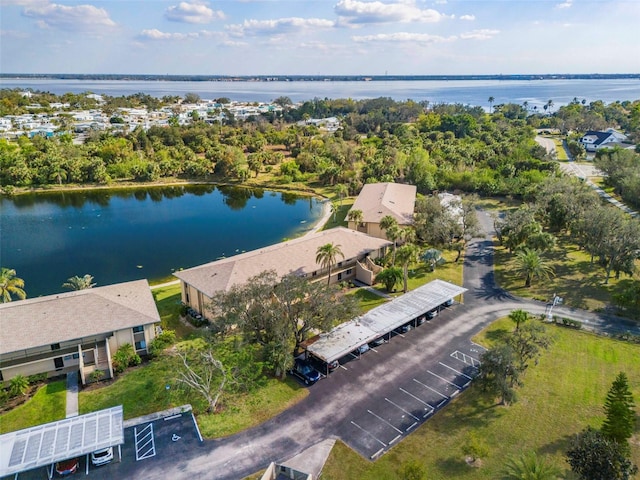 birds eye view of property featuring a water view