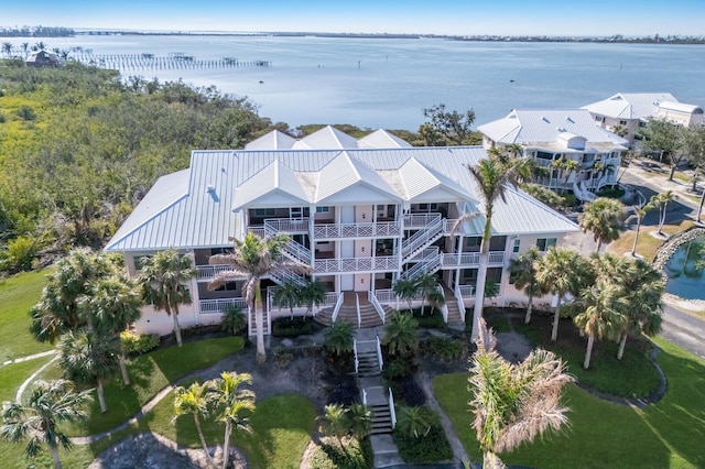 birds eye view of property featuring a water view