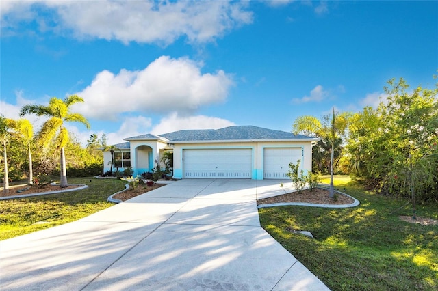 ranch-style house with a garage and a front yard