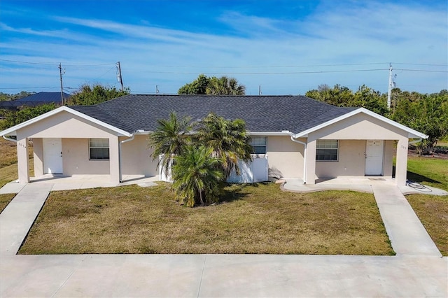 single story home with a front yard