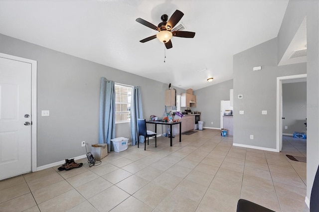 tiled entrance foyer with lofted ceiling and ceiling fan