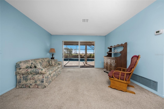 sitting room with light carpet