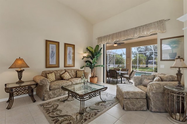 living room featuring high vaulted ceiling and light tile patterned floors