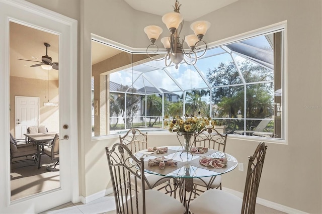 dining room with ceiling fan and plenty of natural light