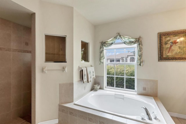 bathroom with independent shower and bath