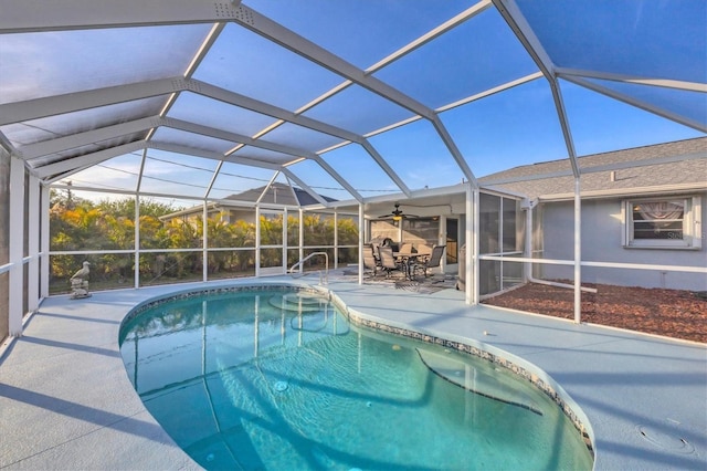 view of pool with a lanai and a patio area