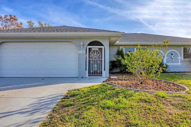 ranch-style home with a garage