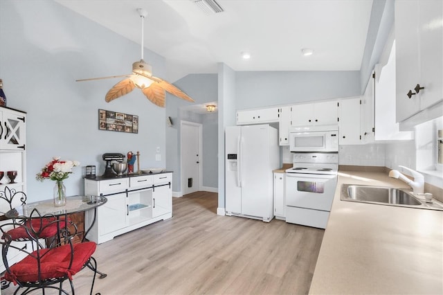 kitchen with sink, white appliances, ceiling fan, white cabinetry, and light wood-type flooring