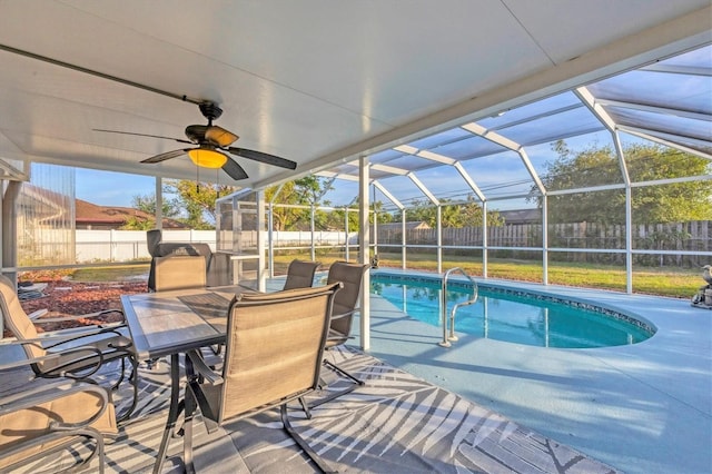 view of swimming pool featuring a lanai, a patio, and ceiling fan