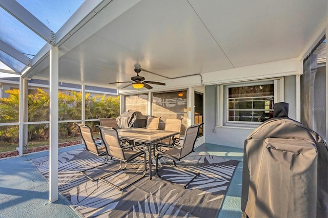 sunroom / solarium with a skylight and ceiling fan