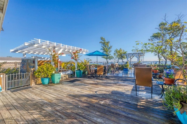 wooden terrace featuring a pergola