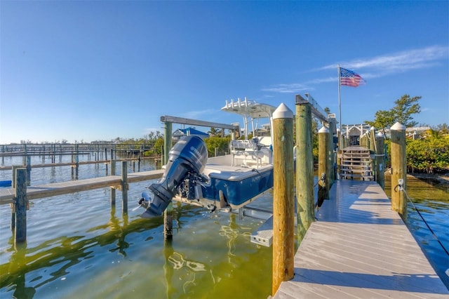 view of dock with a water view