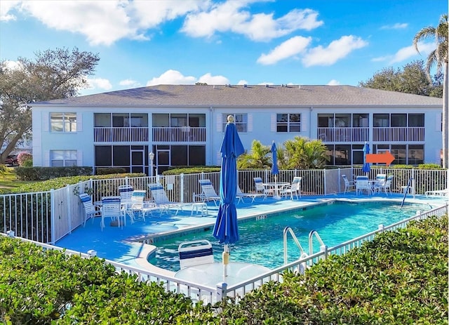 view of swimming pool with a patio