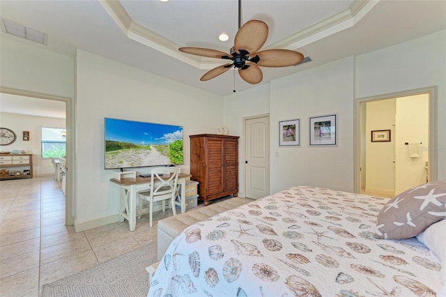 bedroom with a raised ceiling, crown molding, light tile patterned floors, and ceiling fan