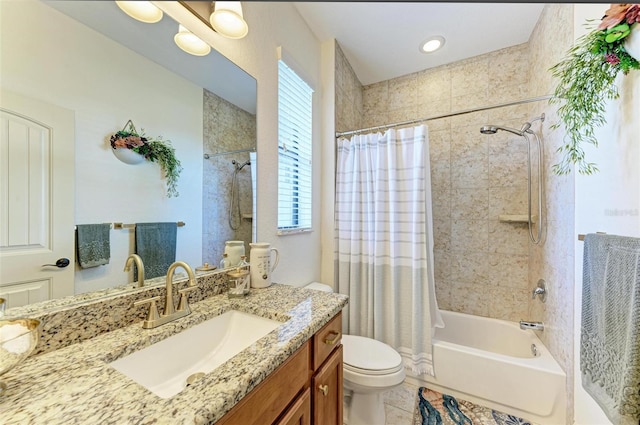 full bathroom with vanity, toilet, tile patterned flooring, and shower / bath combo