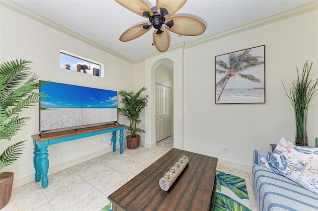 tiled living room with crown molding and ceiling fan