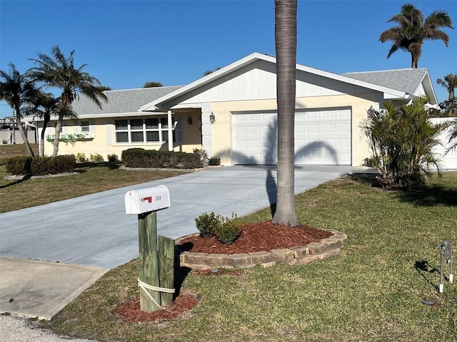 single story home featuring a garage and a front yard