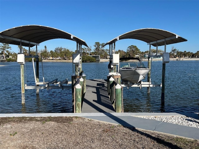 dock area featuring a water view and boat lift